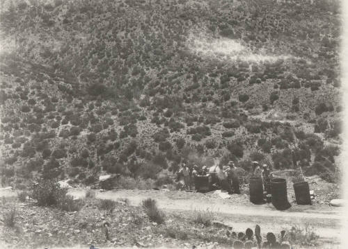 Workers constructing tower footings in the desert