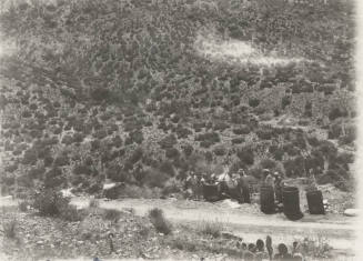 Workers constructing tower footings in the desert