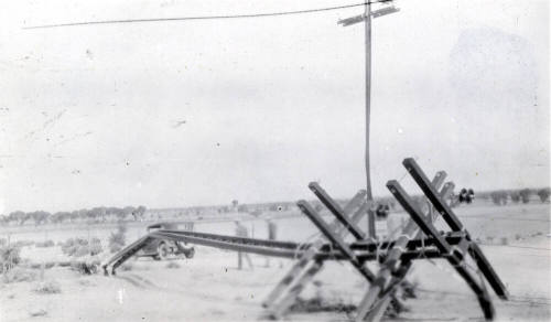 Photo-View of downed storm damaged electrical power lines