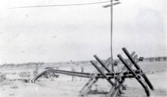 Photo-View of downed storm damaged electrical power lines