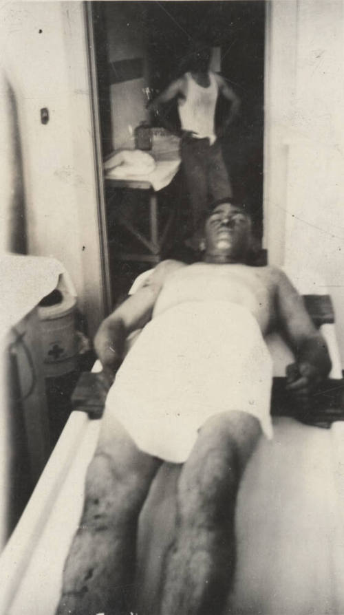 Photo- View of the body of a male suicide victim