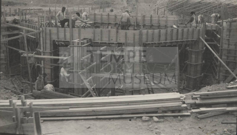 Photo-View of construction workers building forms for a concrete pour
