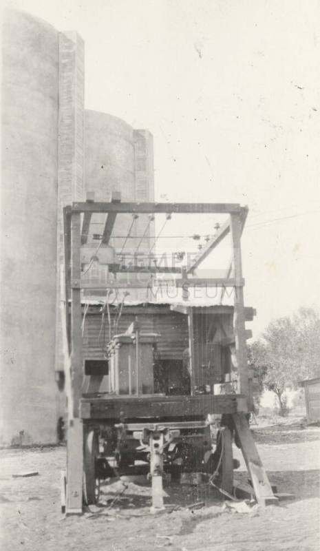 Photo-View of power lines conected to insulators and transformers to power motor