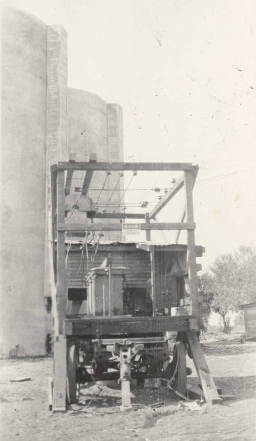 Photo-View of power lines conected to insulators and transformers to power motor