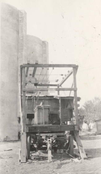 Photo-View of power lines conected to insulators and transformers to power motor