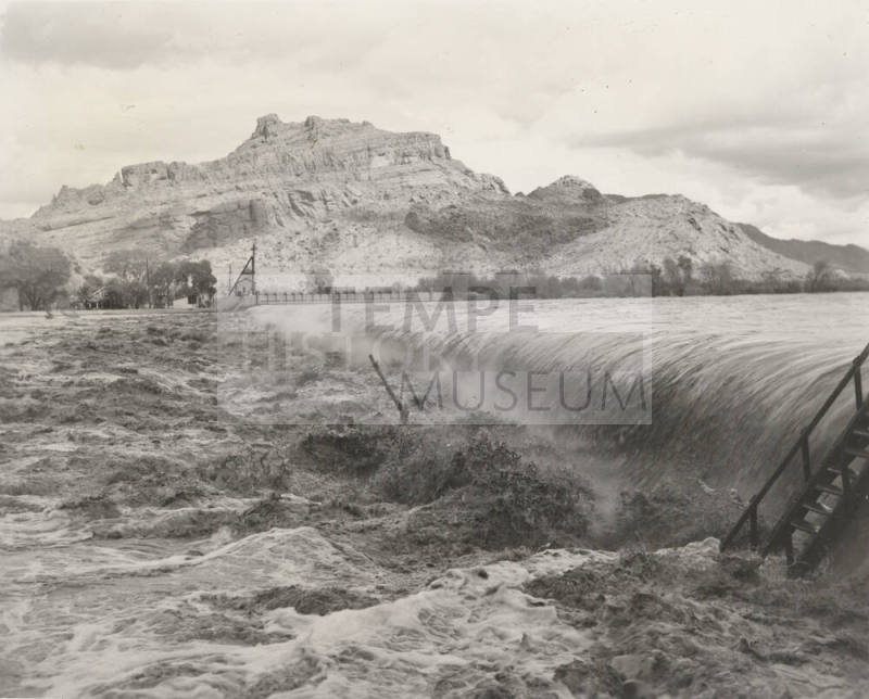 Photo- View of  fast water flowing over Granite Reef Diversion Dam