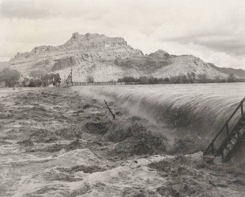 Photo- View of  fast water flowing over Granite Reef Diversion Dam