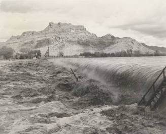Photo- View of  fast water flowing over Granite Reef Diversion Dam