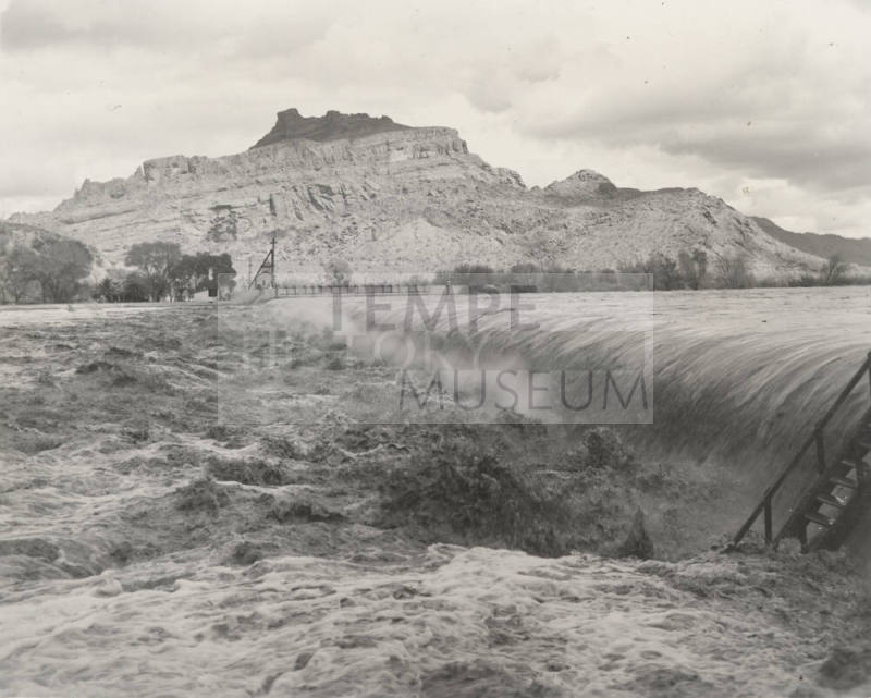 Photo- View of fast water flowing over Granite Reef Diversion Dam