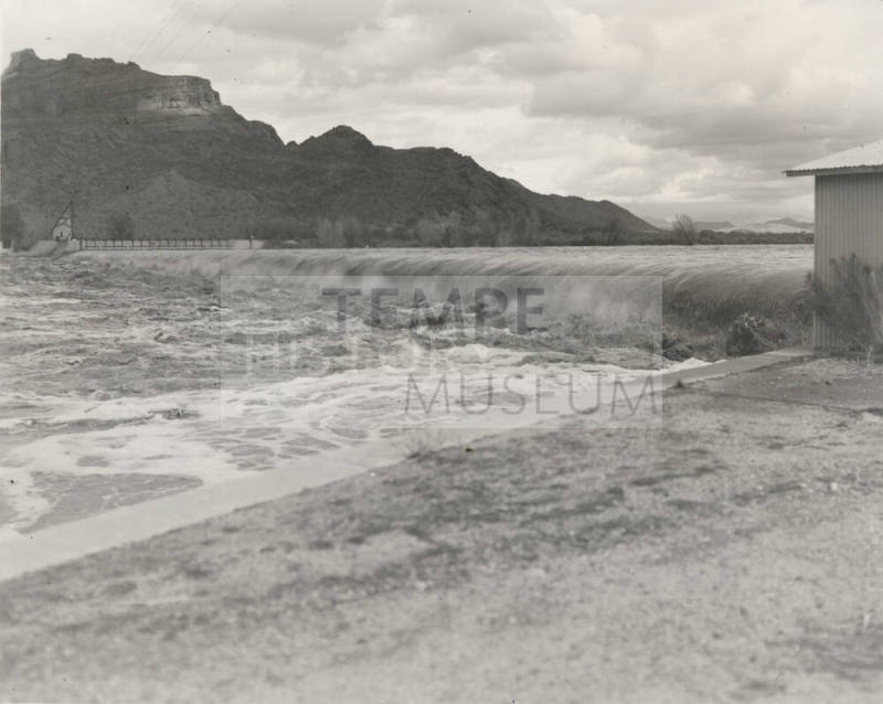 Photo- View of fast water flowing over Granite Reef Diversion Dam