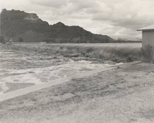Photo- View of fast water flowing over Granite Reef Diversion Dam