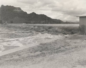 Photo- View of fast water flowing over Granite Reef Diversion Dam