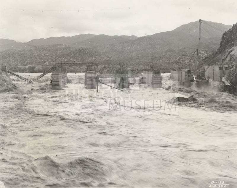Photo- View of a flooded Verde River during the construction of Bartlett Dam