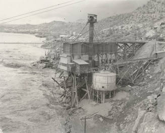 Photo- View of a flooded Verde River during the construction of Bartlett Dam