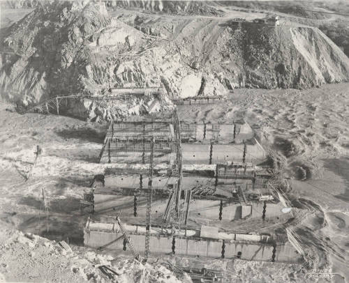 Photo-View of a flooded Verde River showing partial construction of Bartlett Dam
