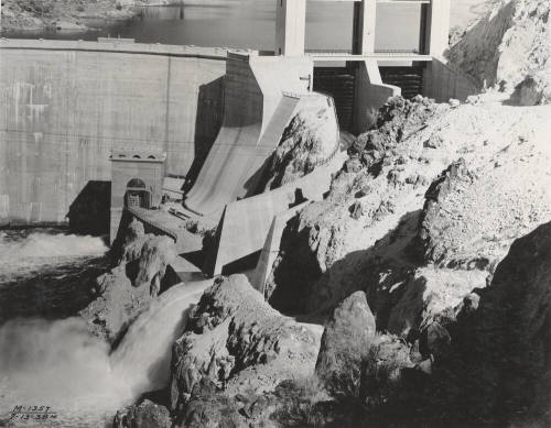 Photo- View of Morman Flat Dam with one gate open 12" for water release