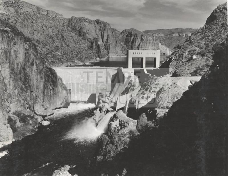 Photo- View of Morman Flat Dam with one gate open 12" for water release