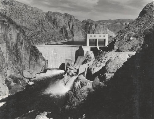Photo- View of Morman Flat Dam with one gate open 12" for water release