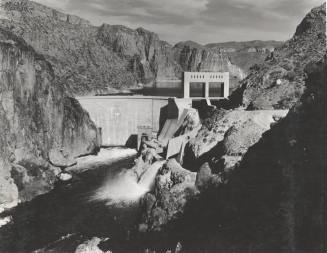 Photo- View of Morman Flat Dam with one gate open 12" for water release