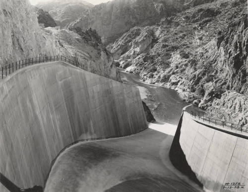 Photo- View of Morman Flat Dam with one gate open 12" for water release