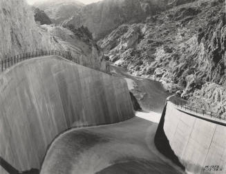 Photo- View of Morman Flat Dam with one gate open 12" for water release