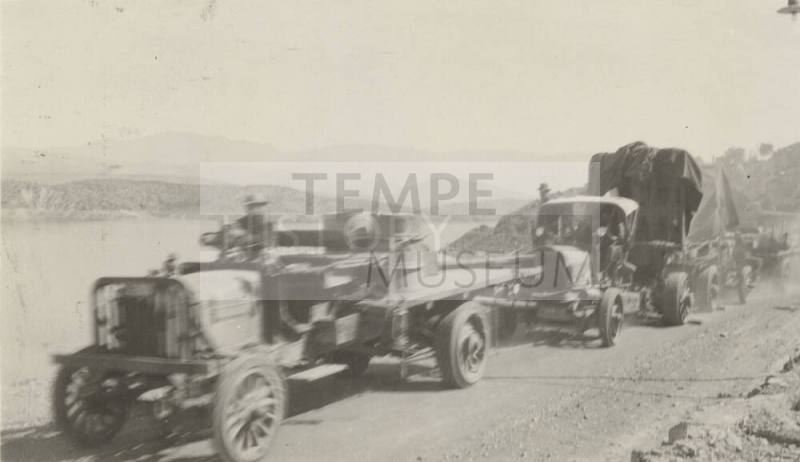 Photo-View of trucks hauling the number seven ( #7 )  generator to Roosevelt Dam