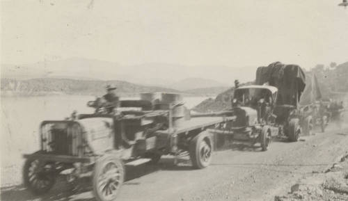 Photo-View of trucks hauling the number seven ( #7 )  generator to Roosevelt Dam