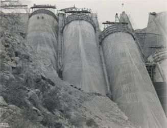 Photo-Partial view of the construction of three of the Bartlett Dam's buttresses
