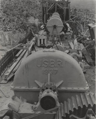 Photo- View of four gear boxes that operate spillway gates at Bartlett Dam