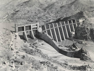 Photo- General view of construction of buttresses and spillway at Bartlett Dam