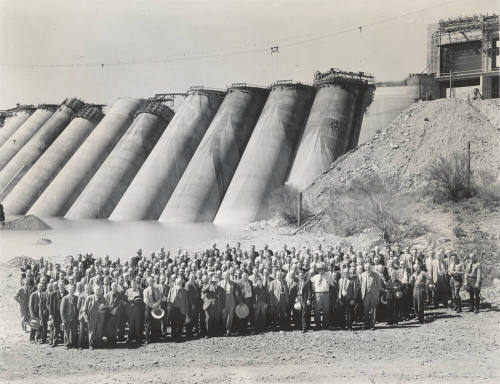 Photo- View of a large group of people in front of the Bartlett Dam