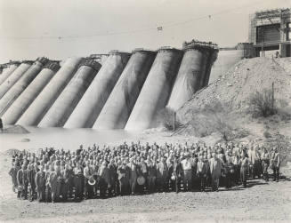 Photo- View of a large group of people in front of the Bartlett Dam