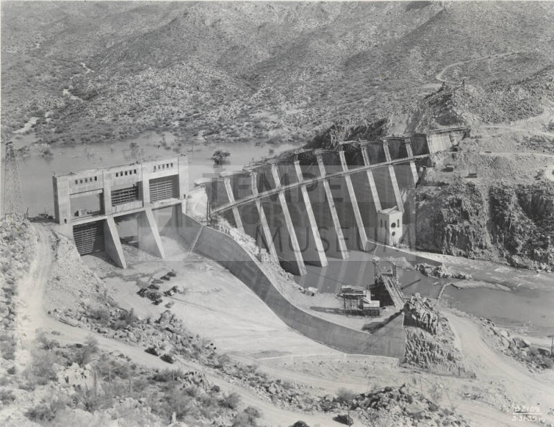Photo- View of Bartlett Dam and spillway gate under construction