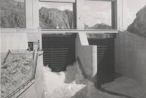 Photo-View of partially open spillway gates at Morman Flat Dam