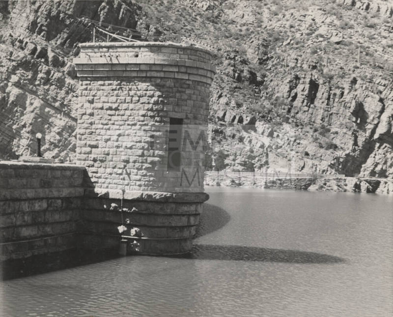 Photo-Close-up view of portion of Roosevelt Dam and the lake