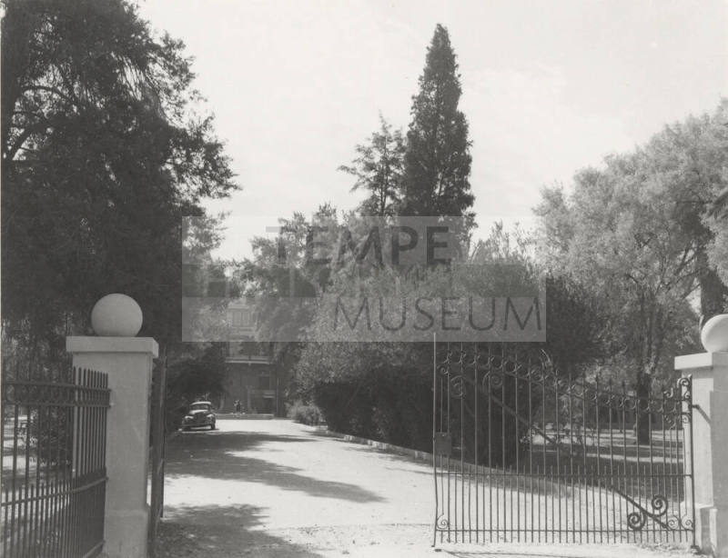 The north gate and drive to Old Main building
