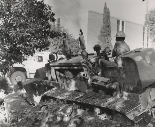 Construction site showing man operating a bulldozer at Arizona State University