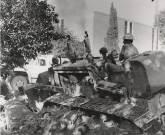 Construction site showing man operating a bulldozer at Arizona State University