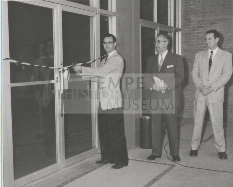 Dale Clarkson, ASASC President, cuts ribbon to north entrance of Memorial Union