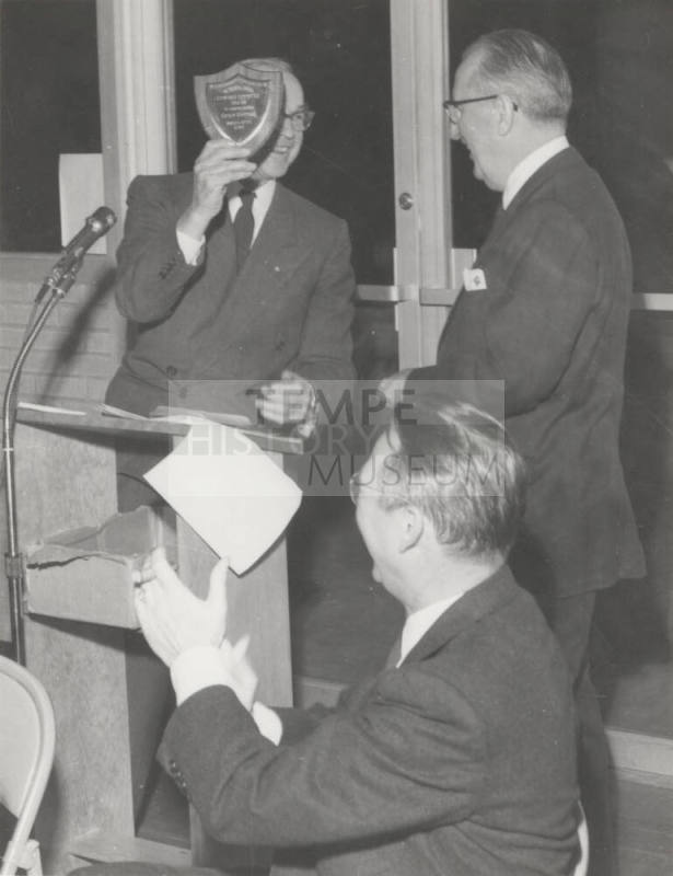 Charles A. Stauffer is applauded by President Gammage on behalf of fund drive