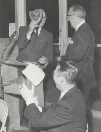 Charles A. Stauffer is applauded by President Gammage on behalf of fund drive