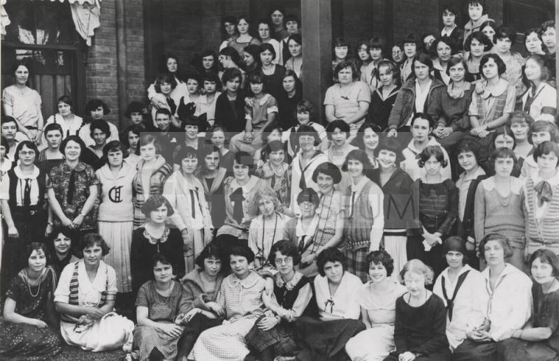 East Hall women's residents posing on west porch entrance