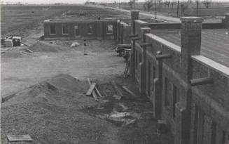 Palm Grove Apartments and Cannery under construction on South Mill Avenue