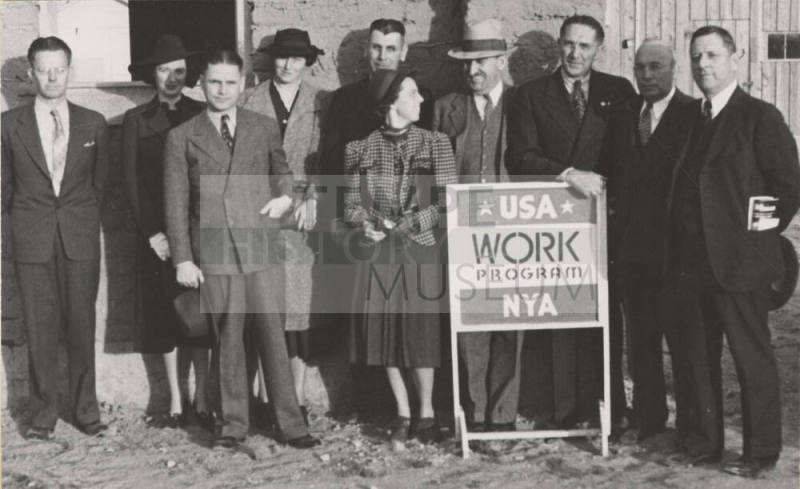 WPA staff members stand in front of B.B. Moeur Activity Building at ASU (still under construction)