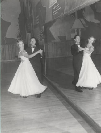 Ballroom dancers in a classroom in the Moeur Activities Building