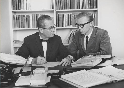 Dr. Arleigh R. Burton, Professor of Accounting, providing extra help to student