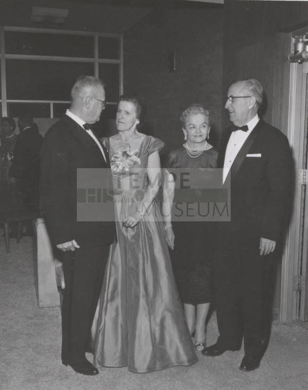 President and Mrs. Gammage talk to Mr. And Mrs. Knorpp