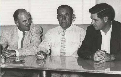 Past athletes get-together with coaches Hascal Henshaw, Ted Shipkey, Dan Devine