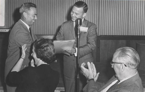Alumni V.P. Wayne Legg greets Jim Creasman at Testimonial Dinner