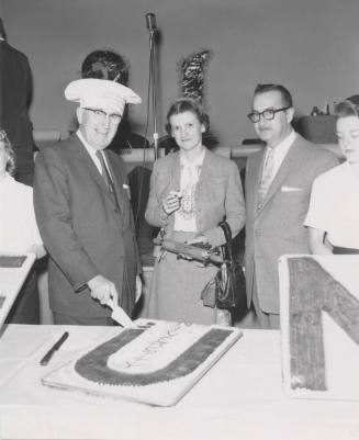 Dr. and Mrs. Gammage cutting ceremonial cake